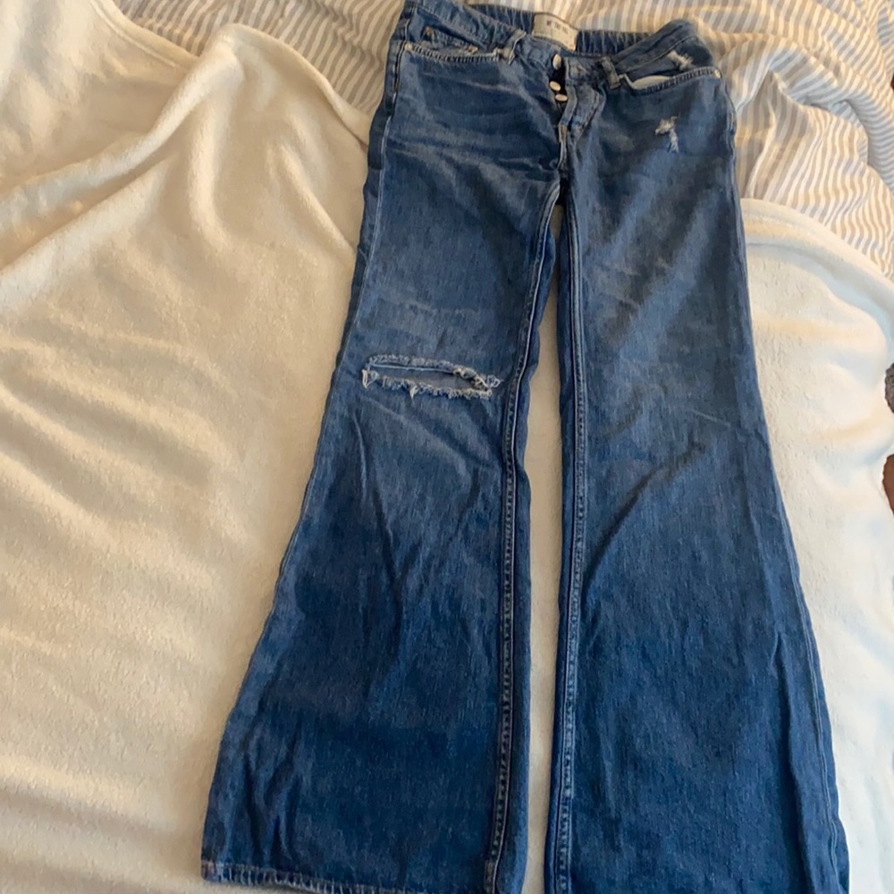 Wide leg free people medium wash denim. To small for me purging closet.